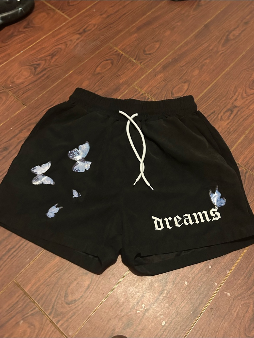 SHEIN Black Butterfly Graphic Shorts with 'dreams' Text